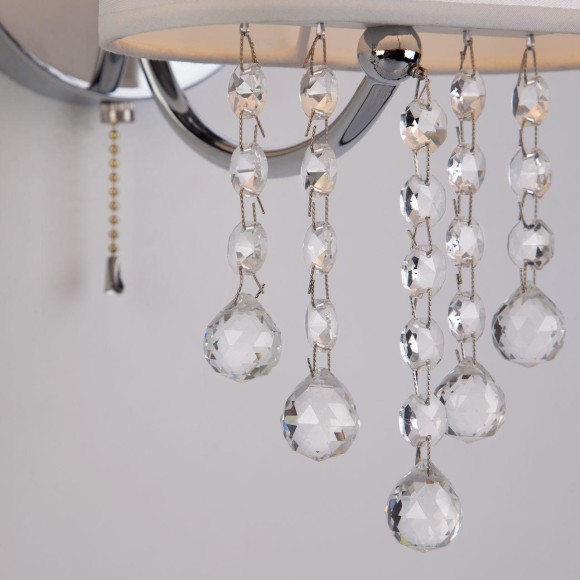 Бра Eurosvet Cornella 10084/1 хром/прозрачный хрусталь Strotskis Бра Eurosvet Cornella 10084/1 хром/прозрачный хрусталь Strotskis